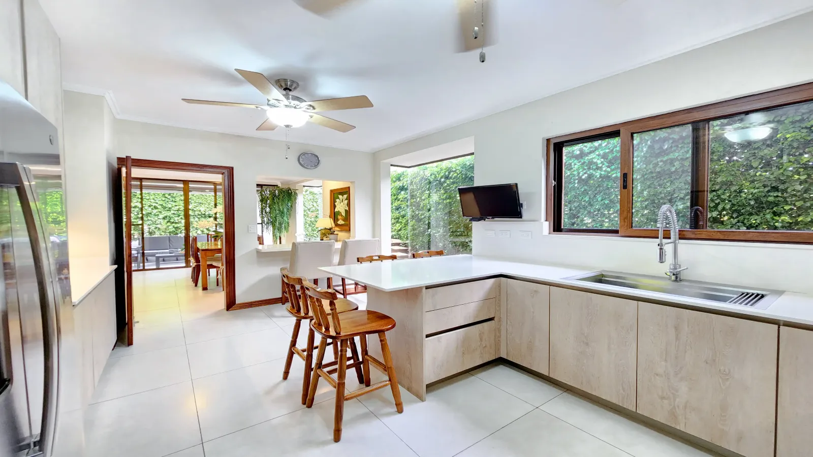 remodeled house Jaboncillos, bright kitchen house for sale, home with garden view terrace, luxury house with pool, Jaboncillos real estate, family home for sale, modern kitchen house Jaboncillos, private condominium amenities, spacious bedrooms Jaboncillos house