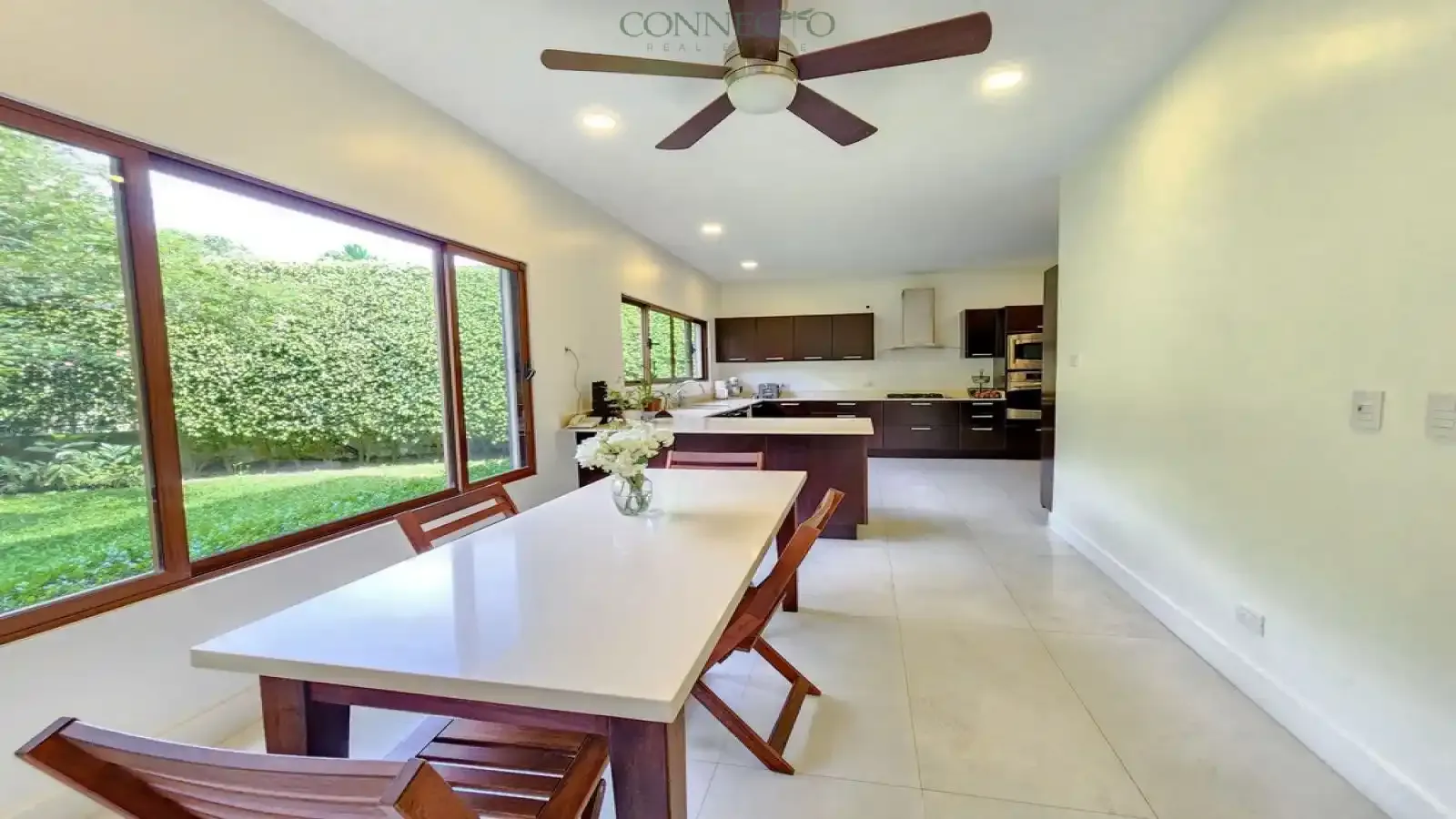 recently remodeled contemporary home, eco-friendly house with a large garden, private 4-bedroom home, green living luxury property, modern sustainable living house, home with terrace and TV room, contemporary eco features, remodeled contemporary home for sale.